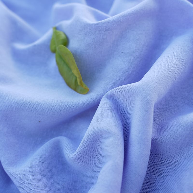 Premium nylon-spandex fabric showing buttery-soft texture for luxury activewear